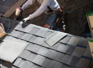worker-installing-asphalt-roofing-wynne-ar